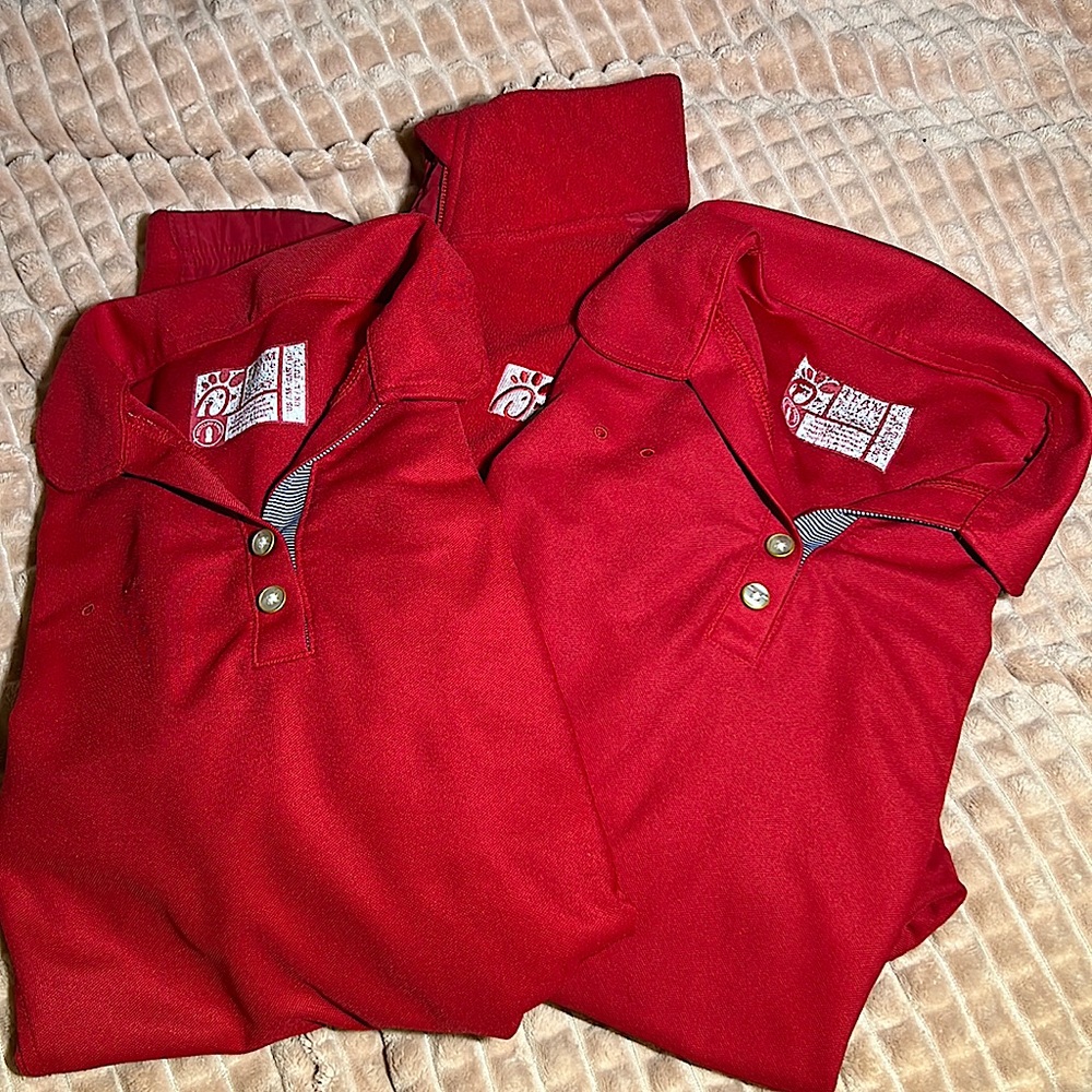 These are great condition chick fil a work sweater and two shirts.